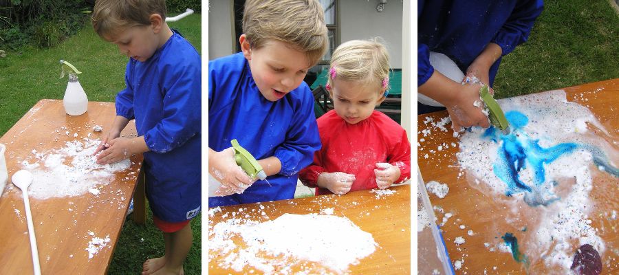 Kids having fun playing with erupting snow sensory material