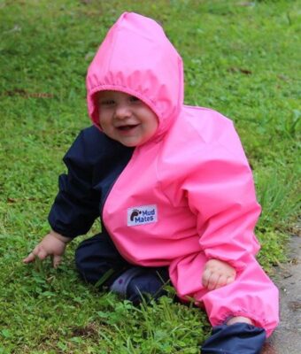 Crawler wearing Mud Mates NZ-made waterproof coveralls and shoe covers. Save money with a Busy Crawler Pack