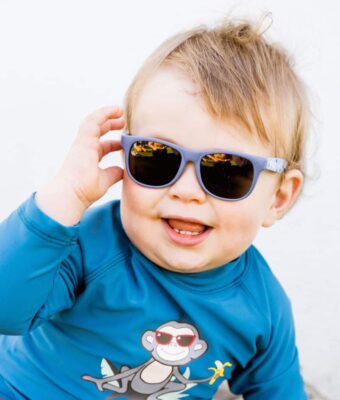 Baby boy wearing Beachcomber Starry Nights kids sunglasses