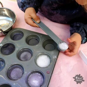 Magical Potion Tips: young girl playing with magical potions in a mini muffin tray