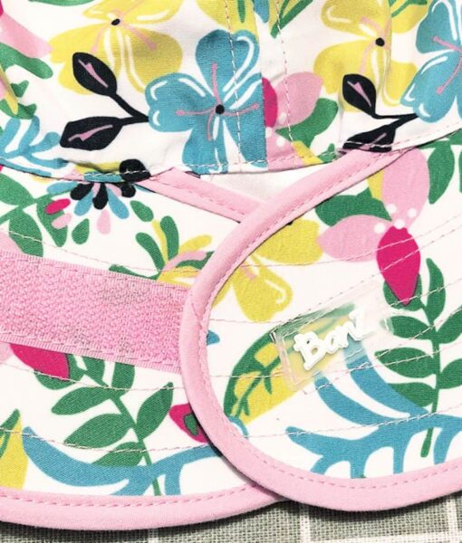 Botanical print reversible kids sun hats. Features a velcro closure at the back of the brim, to allow easy adjustment, giving years of wear as your child grows. This is also useful as a place to fit through a ponytail.
