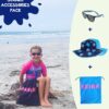 Young girl sitting on the beach with her Mud Mates Kids Summer Accessories Pack - includes NZ-made swim bag and cute, quality kids sunglasses and sun hat