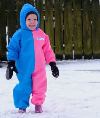 Waterproof children's coveralls designed for messy play and outdoor adventures, shown here in our turquoise/pink combo.