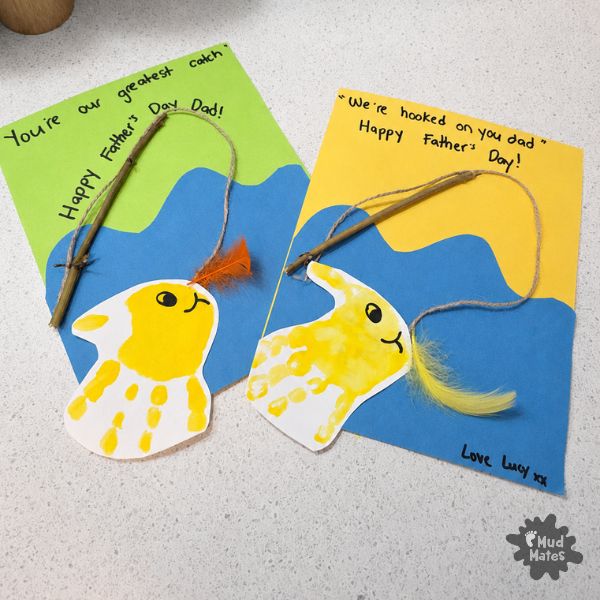 Father's Day craft for kids - two finished handprint fishing cards in green and yellow with "You're our greatest catch" and "We're hooked on you Dad"