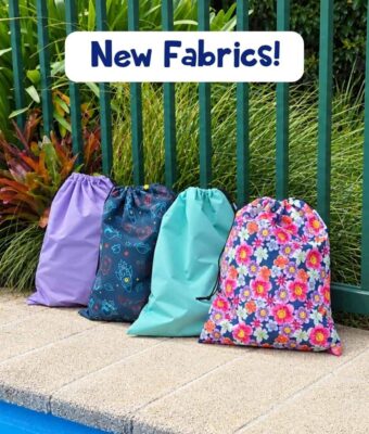 Four personalised swim bags in lilac, space, spearmint and floral fabrics by the pool